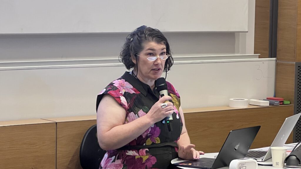Elaine Miller presenting her paper on gender surgery and incontinence at the CAN SG Rethinking Youth Gender Medicine conference 6 July 2026