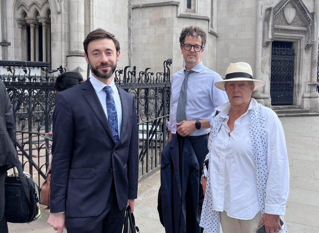 (l-r) James Esses (claimant), James Gardner (claimant lawyer), Kate Harris (LGB Alliance) outside court on Tuesday morning