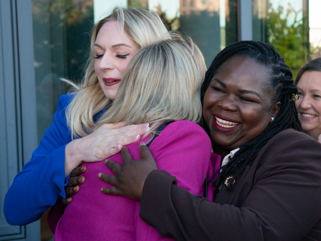 Hutchison and Melle meeting Sandie Peggie outside Dundee Emplyment Tribunal this morning